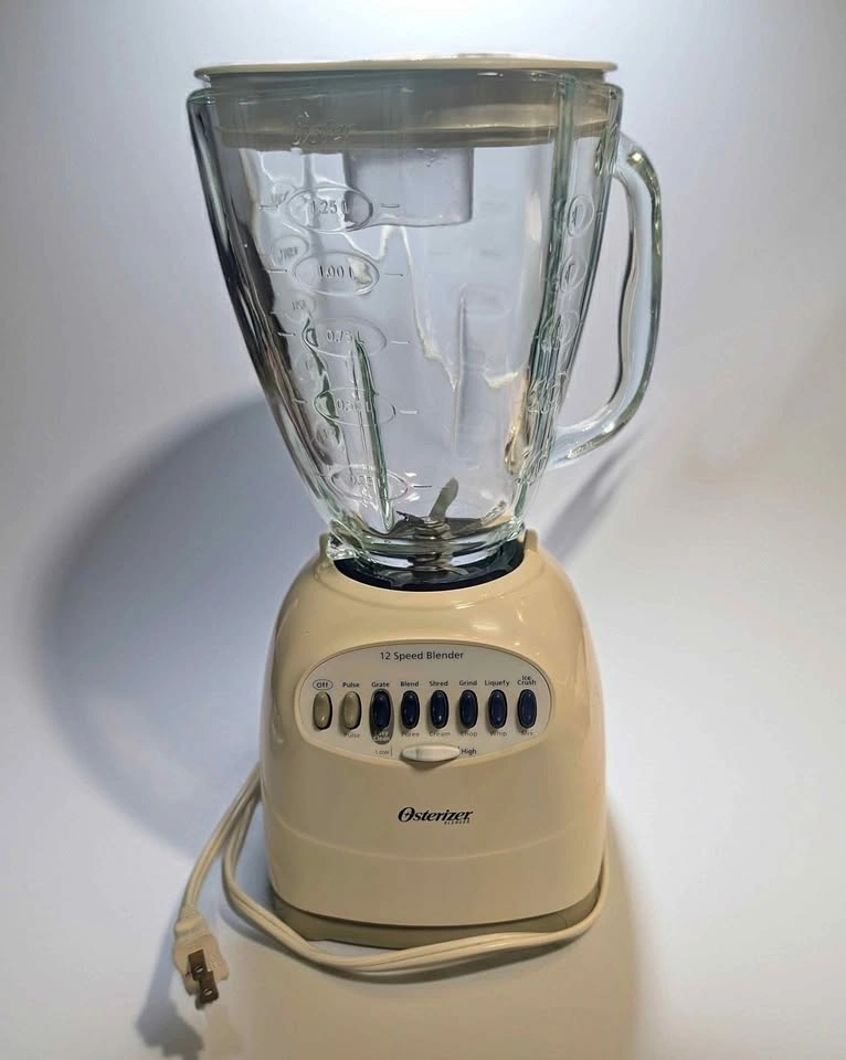 Osterizer Blender, 12 speed w/ glass pitcher
