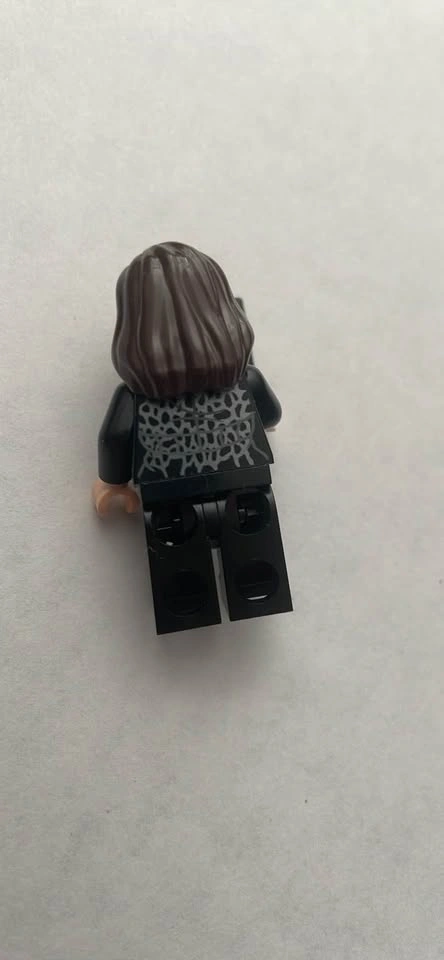 LEGO minifigure with brown and blonde streaked hair and a black - photo 2