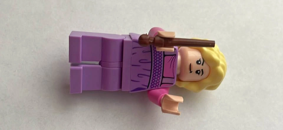 LEGO Minifigure - Blonde Hair, Pink Top, Purple Legs, Wand