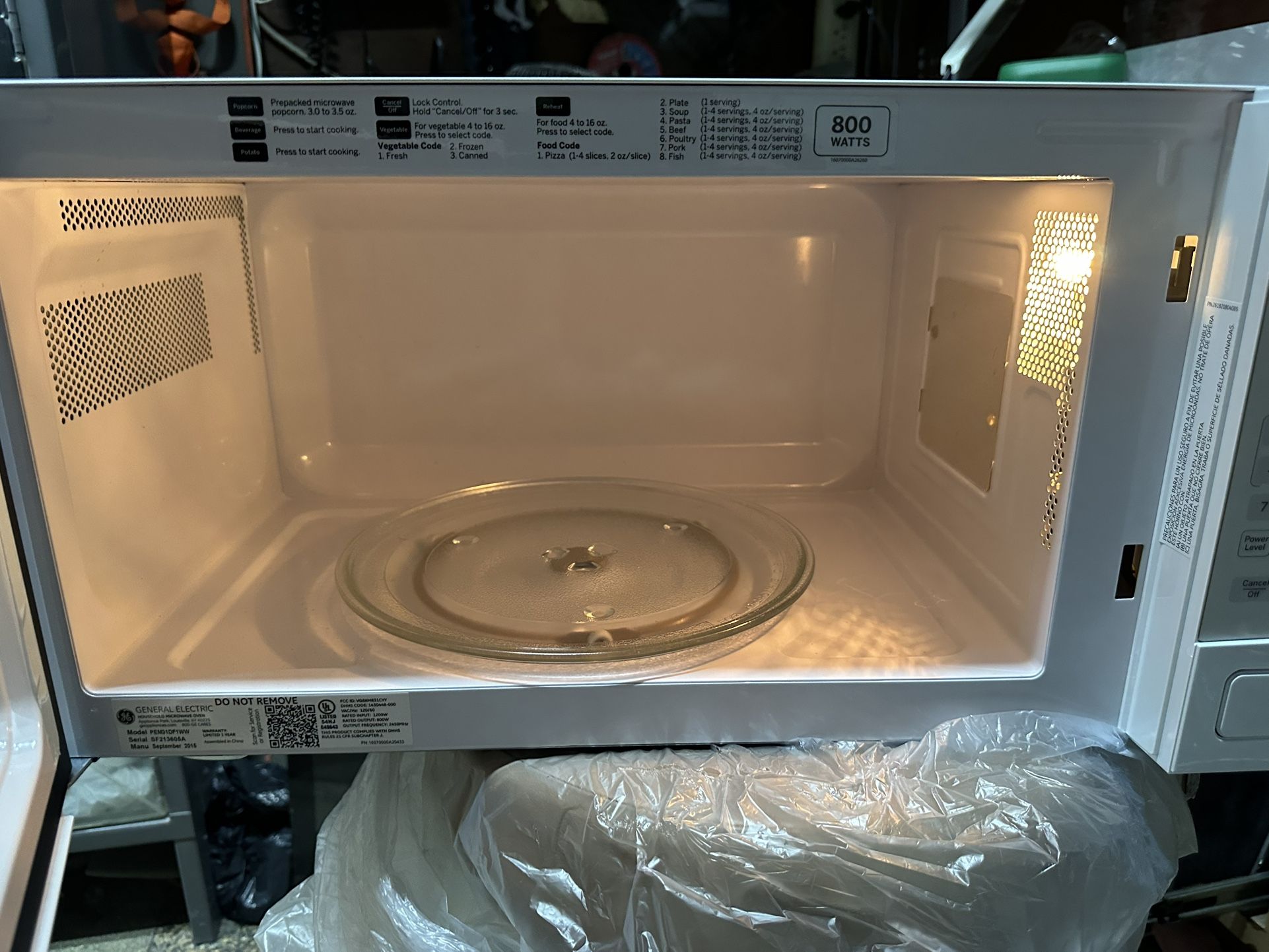 GE PEM31DFWW Profile 1.1 Cu. Ft. White Countertop Microwave - photo 3
