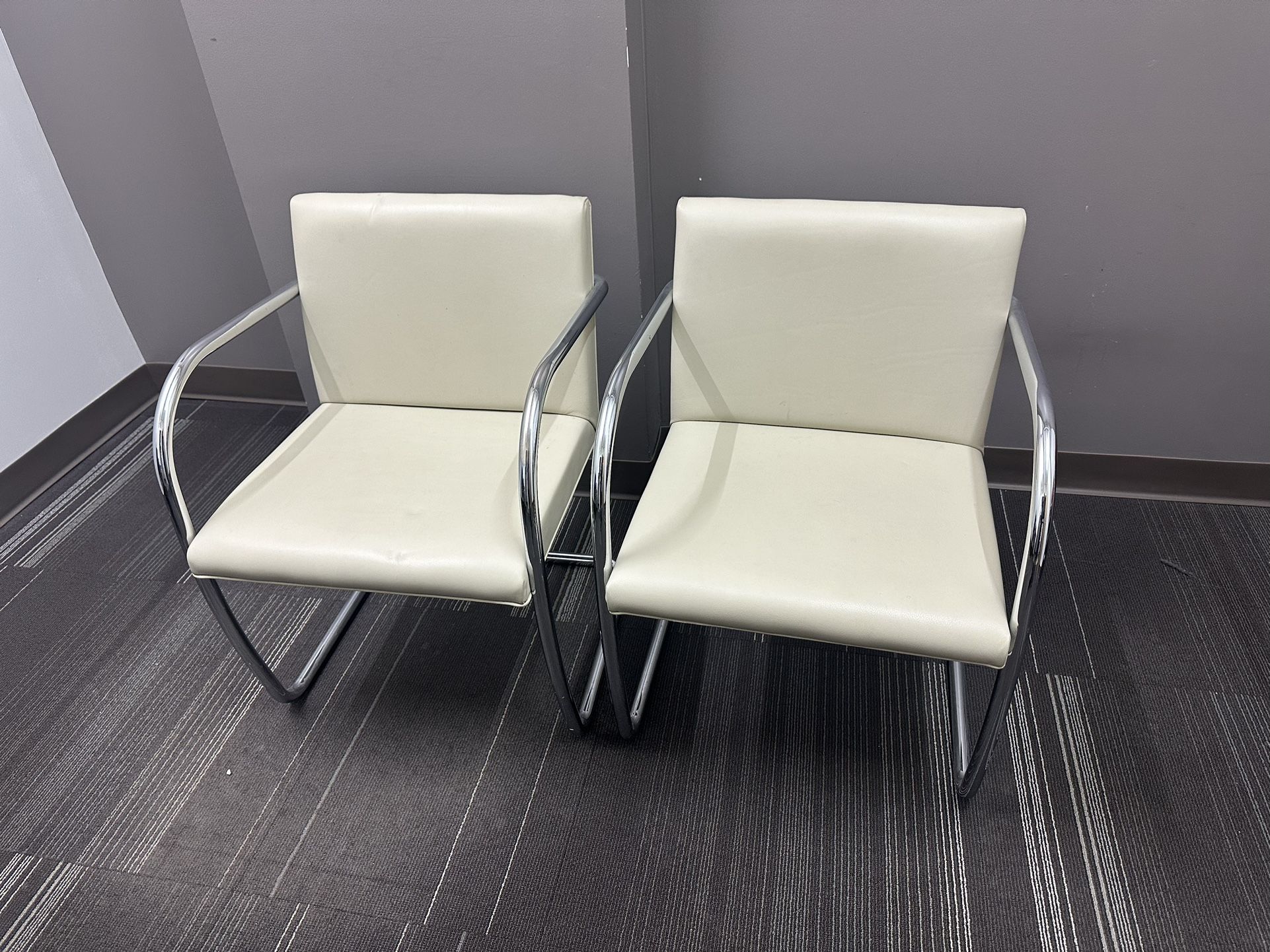 2 Mid-Century American White Leather and Chrome Armchairs