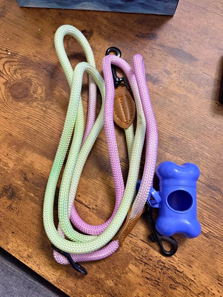 Hands free rope dog leash with poop bag holder