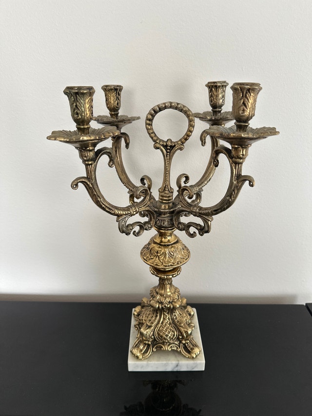 Gold solid metal four-arm candelabra