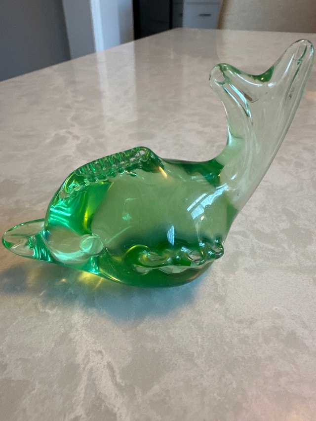 Glass dolphin paperweight
