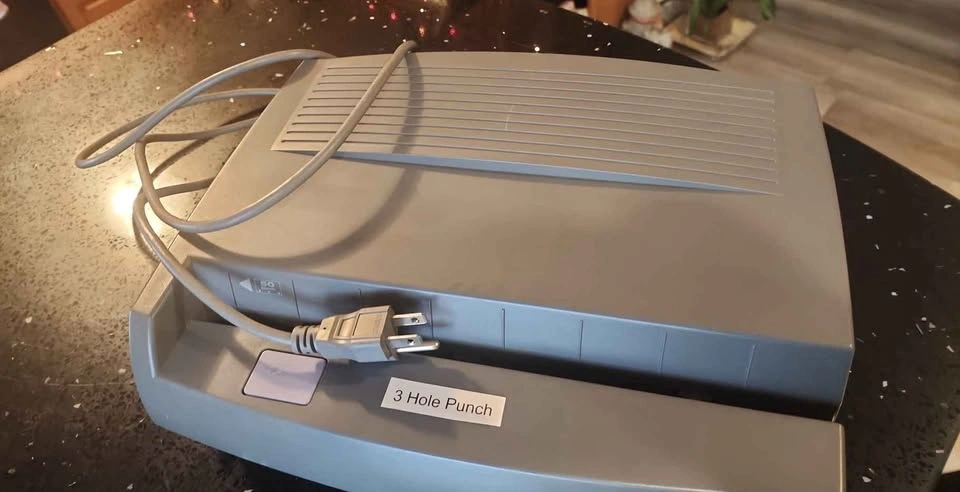 Automated 3 hole punch machine