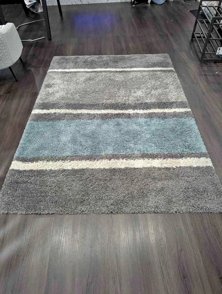 Spacious Rug. Barely used.