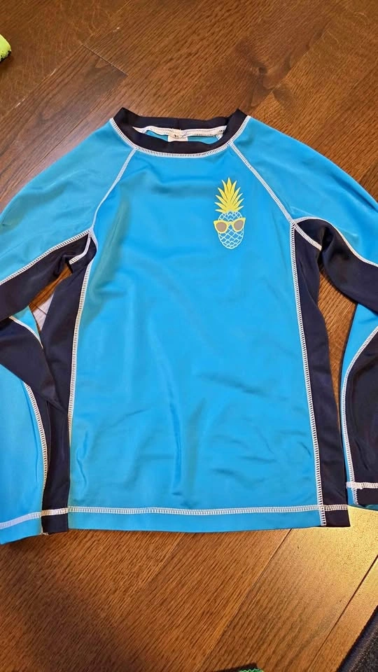Like new! Swim shirt