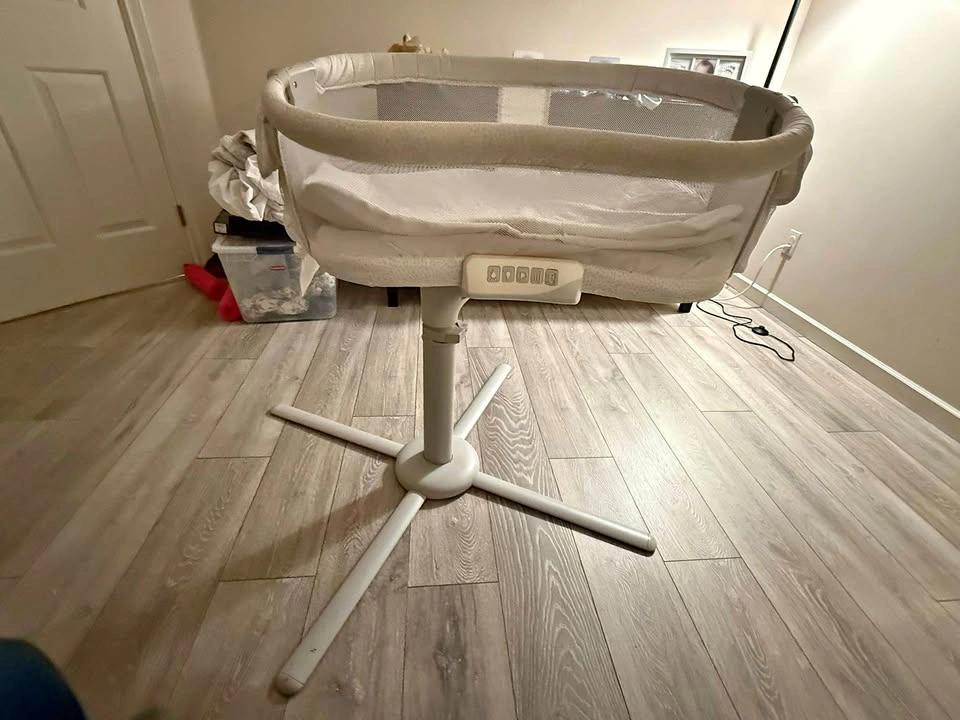 Bassinet with sound machine and vibration