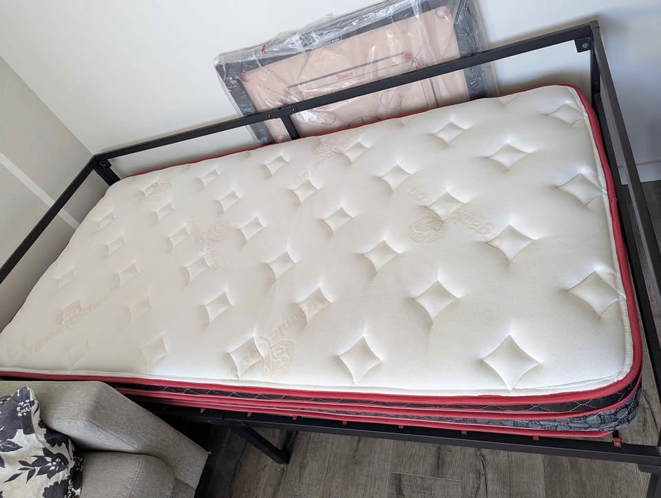 Barely used twin size mattress + frame