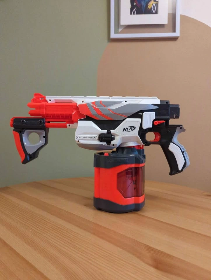 Nerf Vortex Pyragon gun with discs