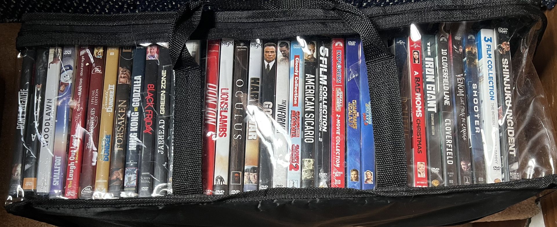 35 Brand New Sealed DVDs in Vinyl Storage Bag