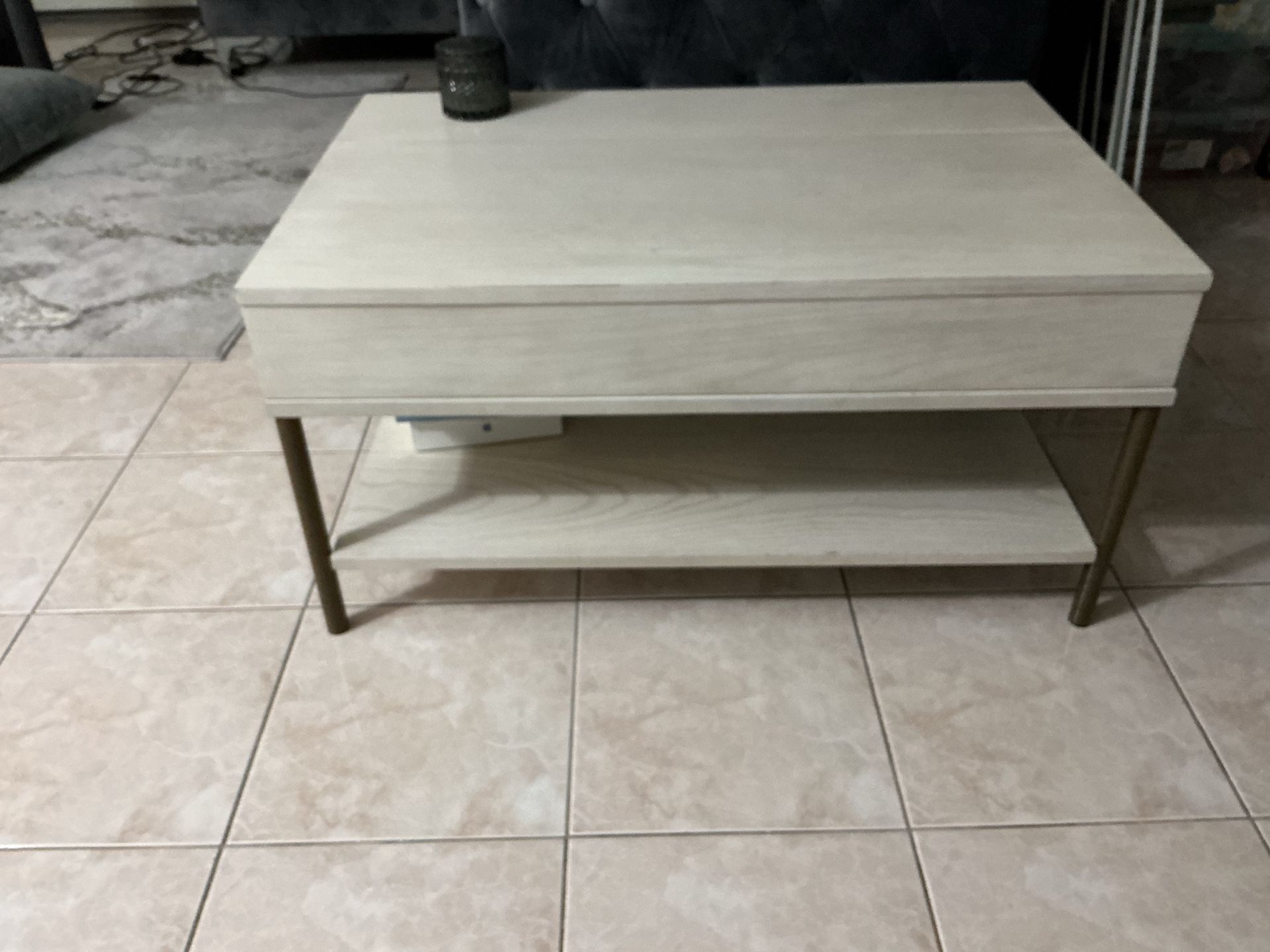 Coffee table with lift top