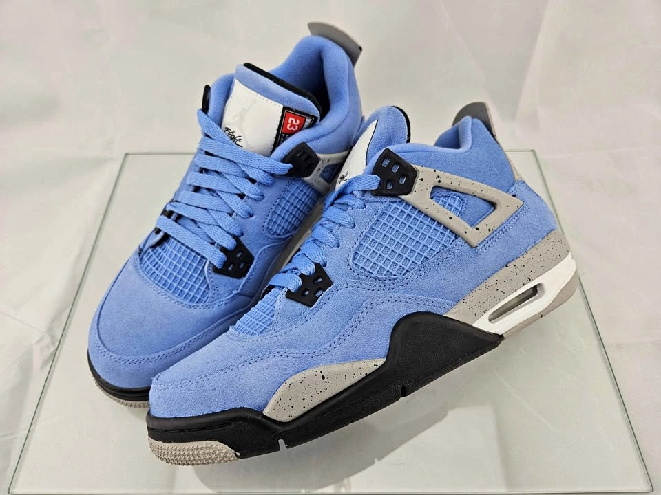 Jordan 4 Retro University Blue Youth 7 / Women's 8.5