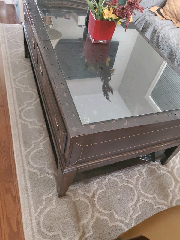 High end coffee table 27in; x 4in; with leather drawers