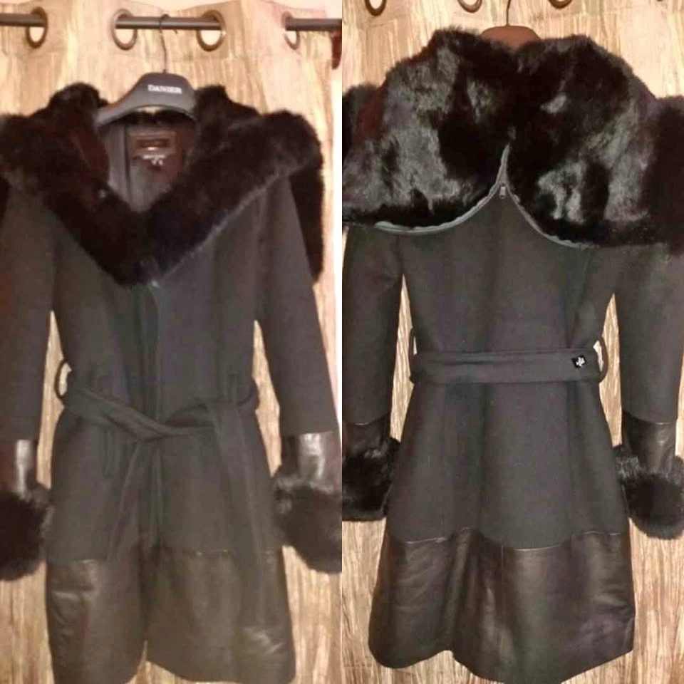 Gorgeous wool and leather coat by Danier. Retails $1000.00 Small