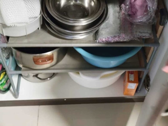 Under sink storage shelf