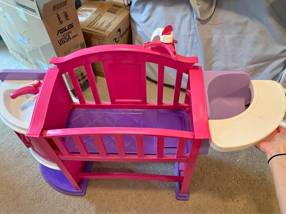 Baby doll crib and play center