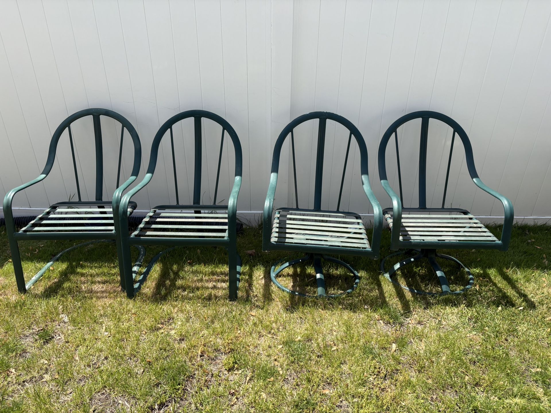 Outdoor Chairs 2 Swivel Chairs $80