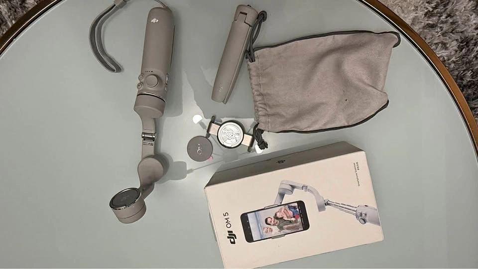 Like NEW DJI OM 5 Gimbal – Comes with everything in original box