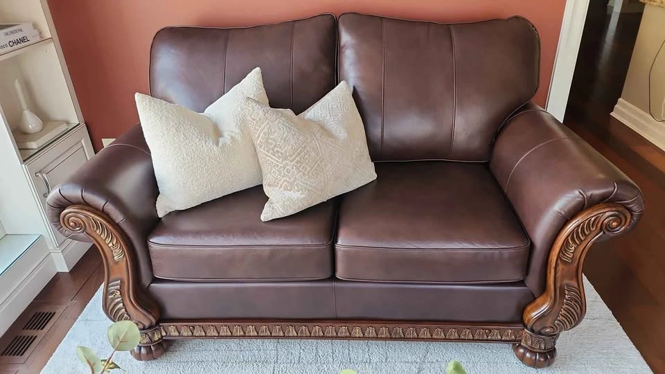 Ashley Furniture Dark Brown Leather Loveseat w/ Wood Trim - photo 5