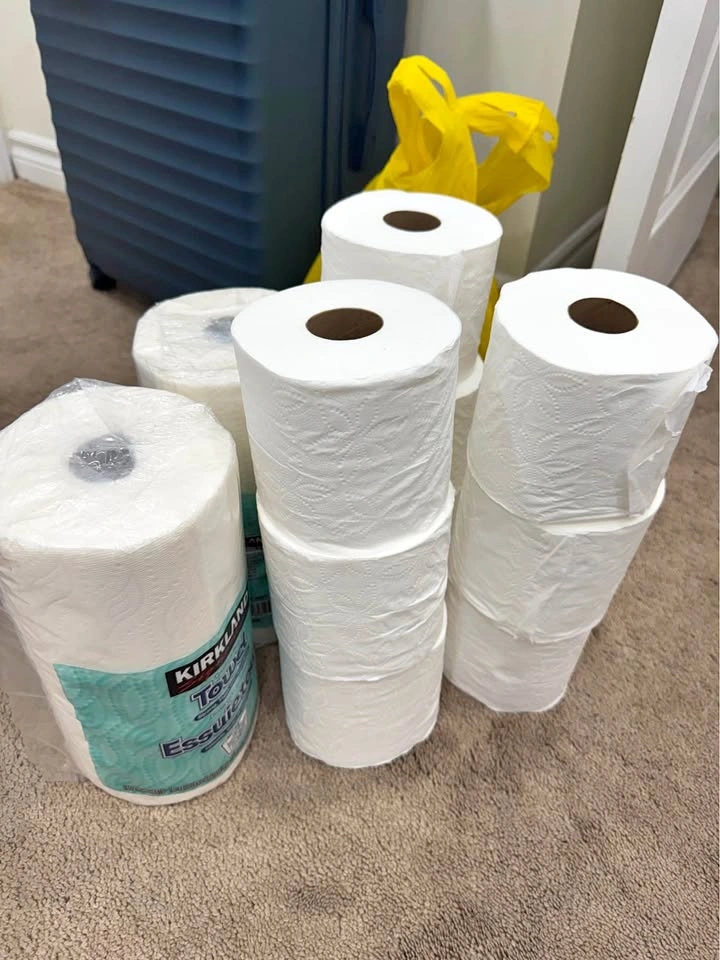 Brand new 2 kitchen towels and 9 bath tissue rolls