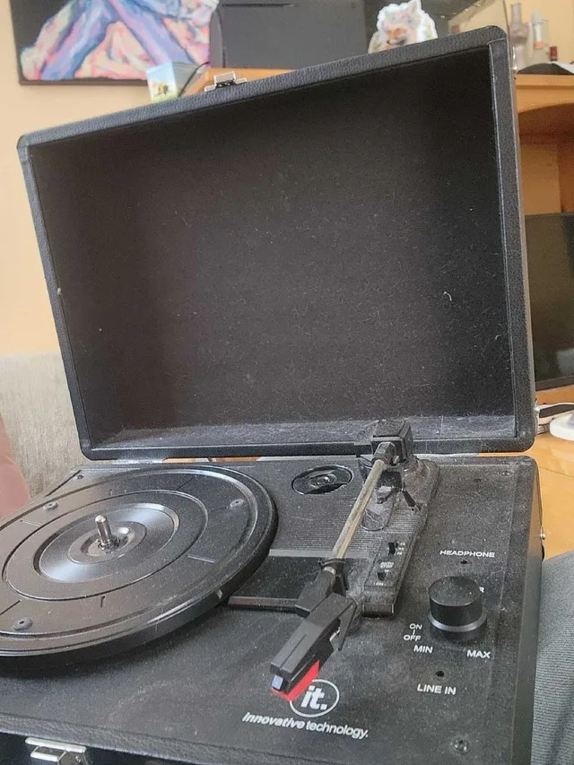 Record player with power cord