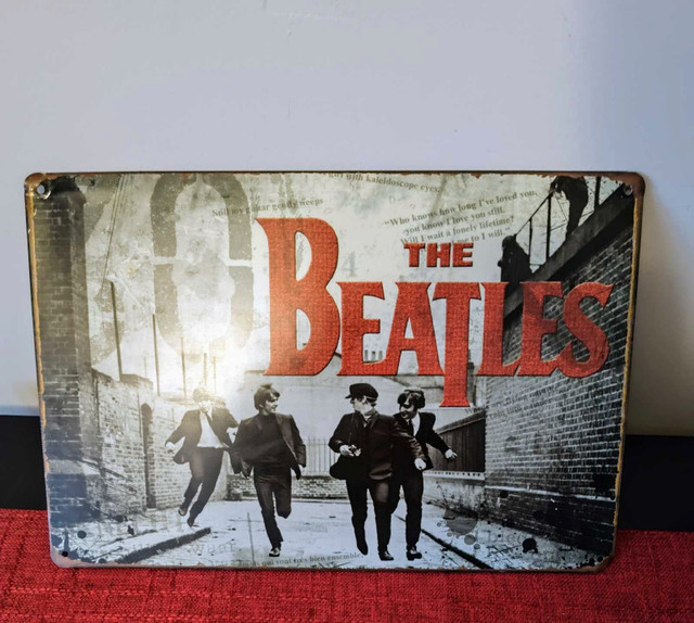 The Beatles tin sign 8"x 12"