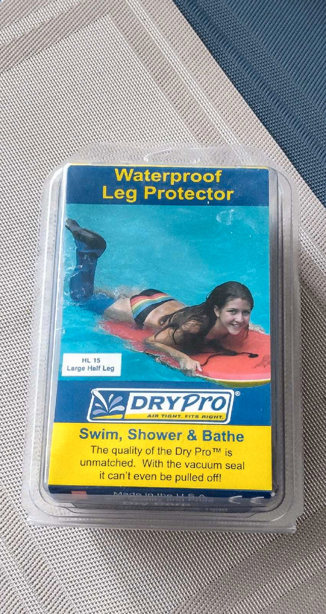 Brand new waterproof leg protector size large