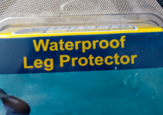 Brand new waterproof leg protector size large - photo 3