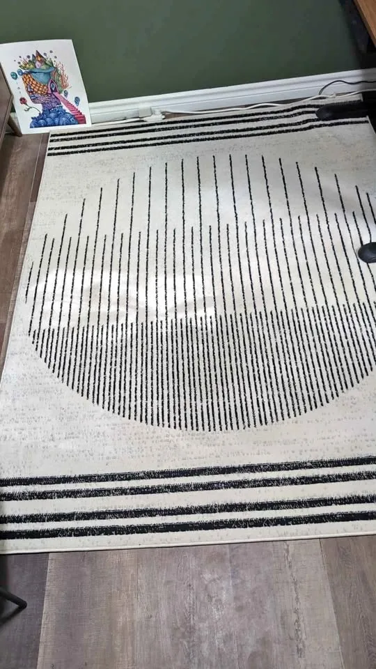 5' x 7' cream and black area rug thumbnail