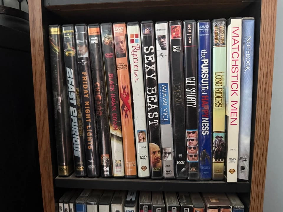 77 DVDs plus stand - photo 4