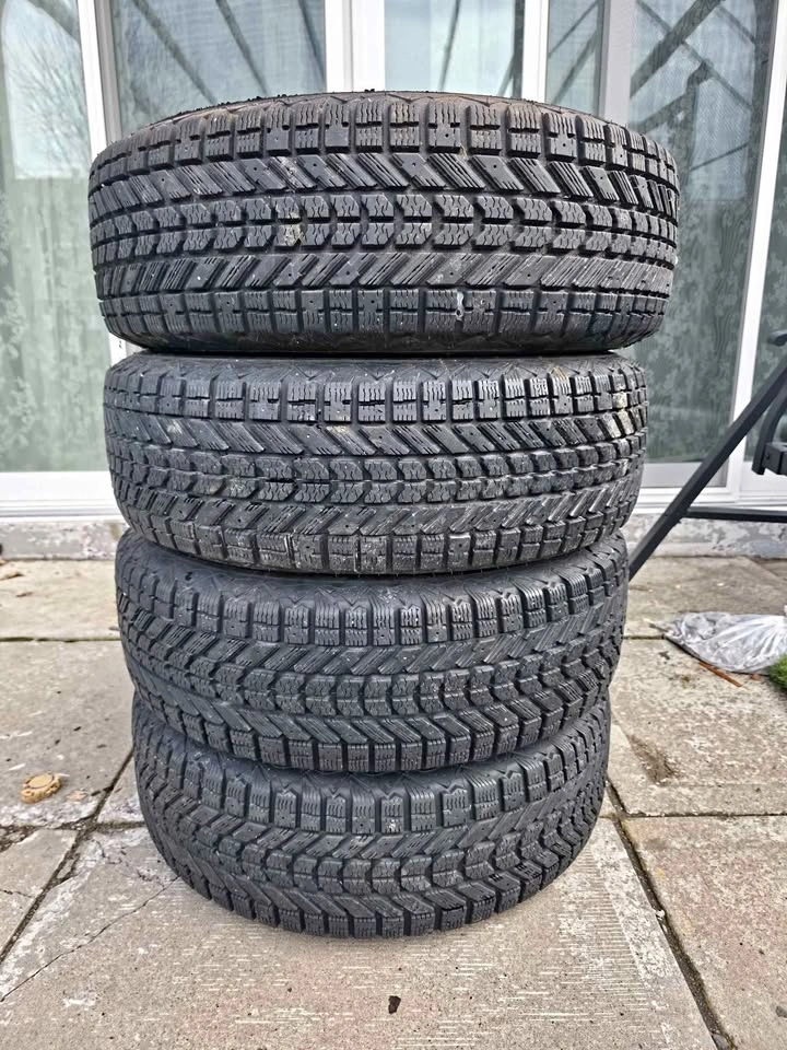 215/70R16 Firestone Winter Tires on Rims - Set of 4