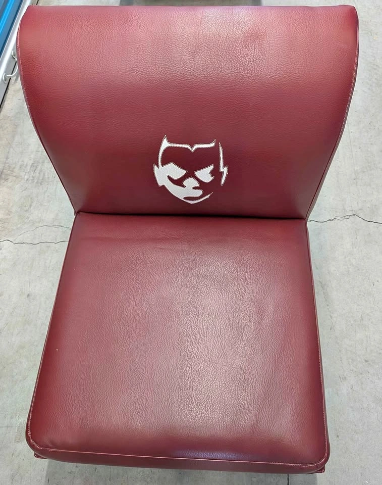 Red cushion chair with Cool Logo