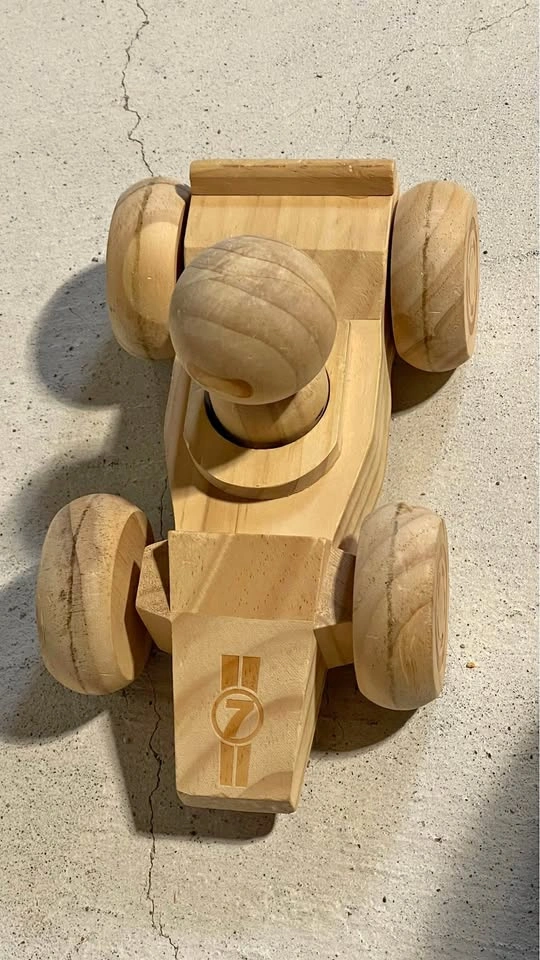Cool wooden race car with driver
