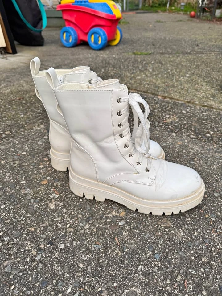 White laced up boots