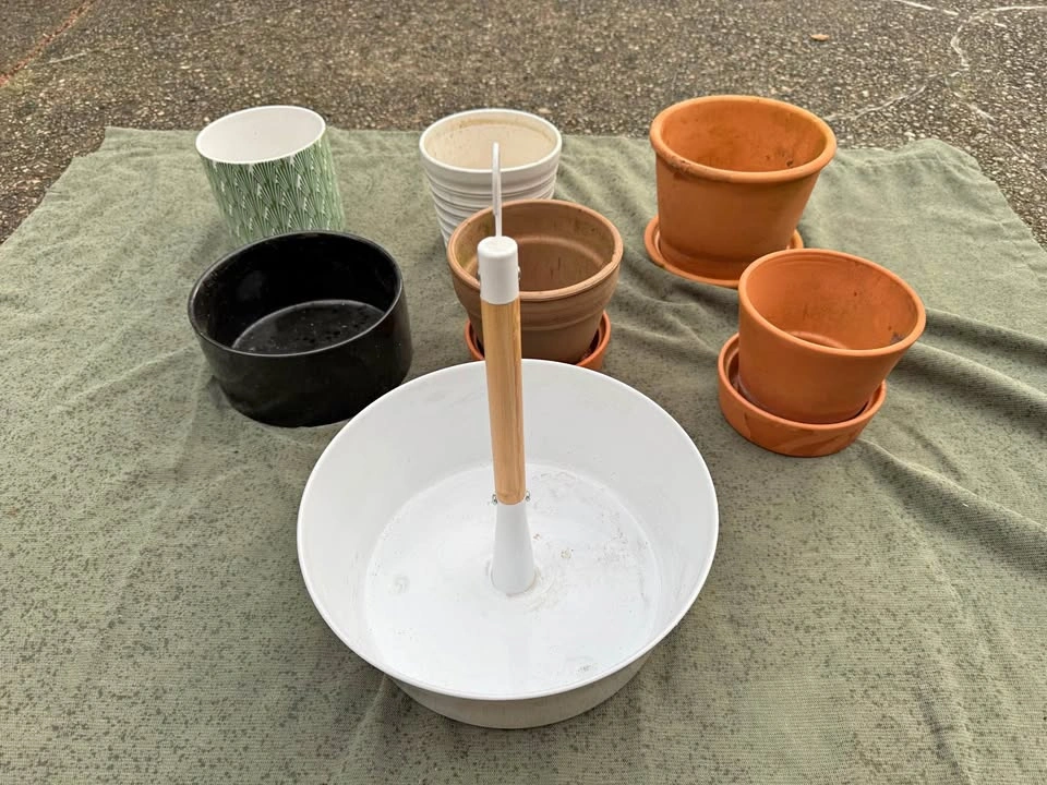 All for $10! Plant clay pots and rack