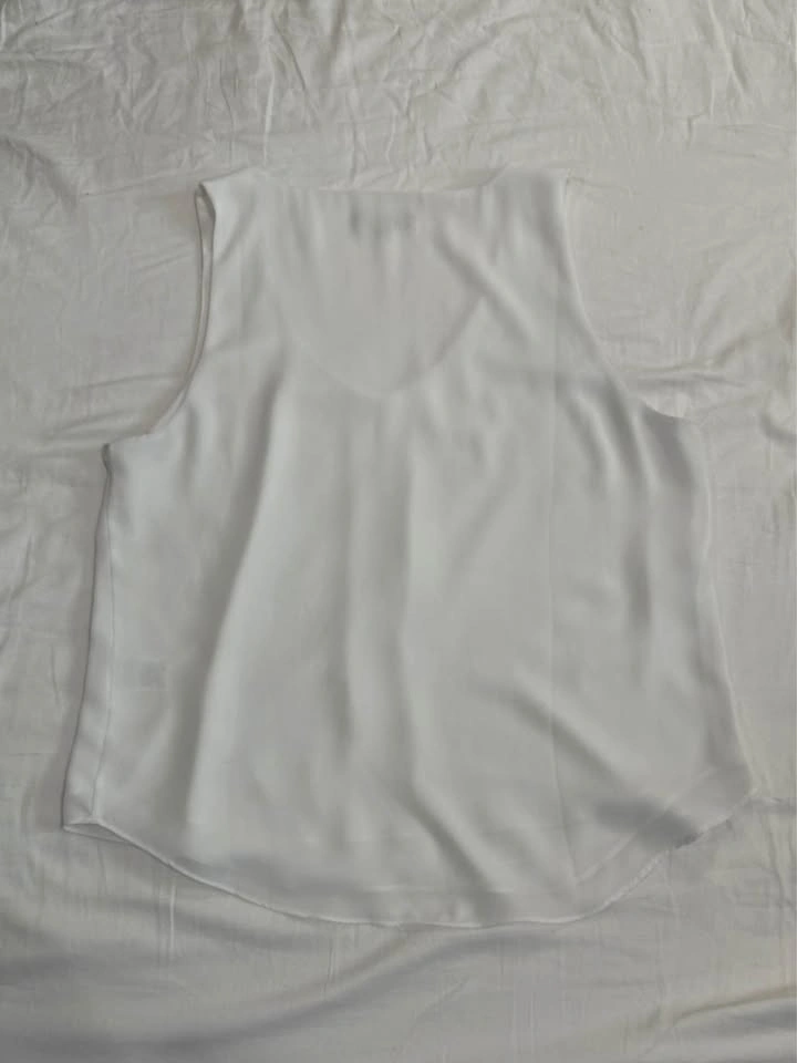 Sleeveless V-Neck Blouse - photo 2