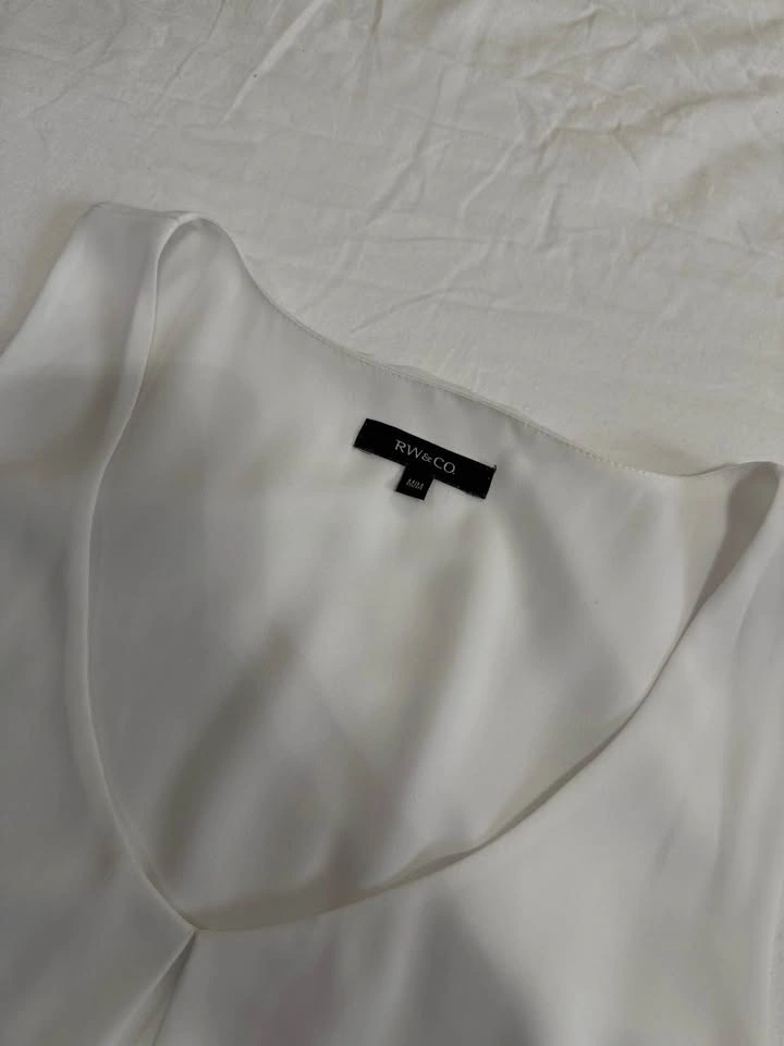 Sleeveless V-Neck Blouse - photo 3