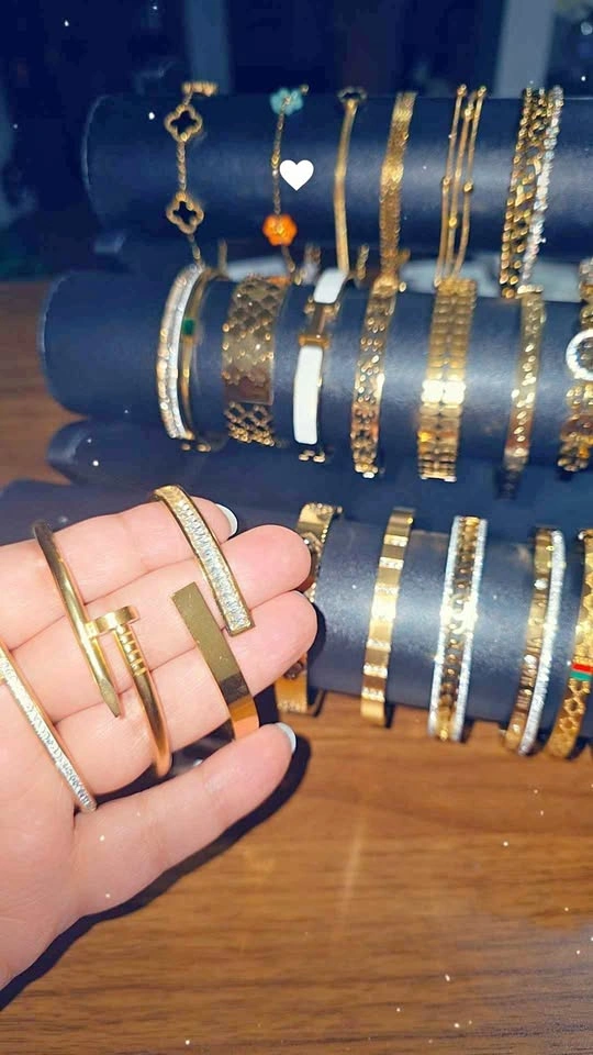 Gold-tone fashion bracelets and rings