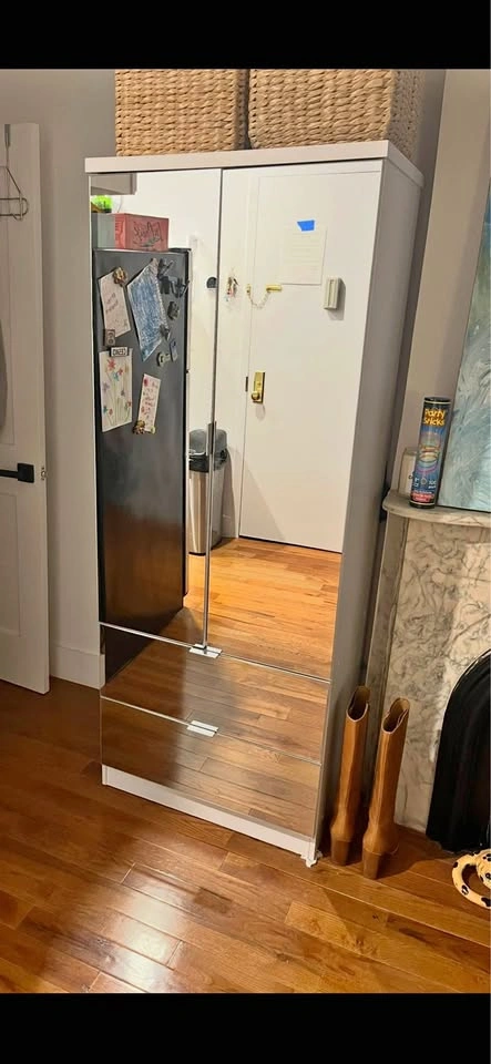 Wardrobe with mirrored doors