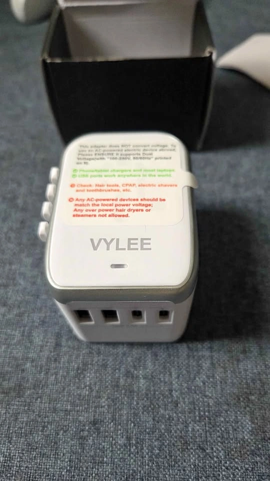Travel adapter new (firm)