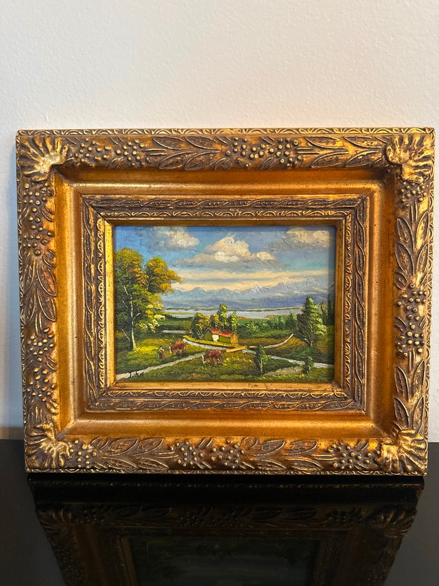 Oil on wood signed painting .