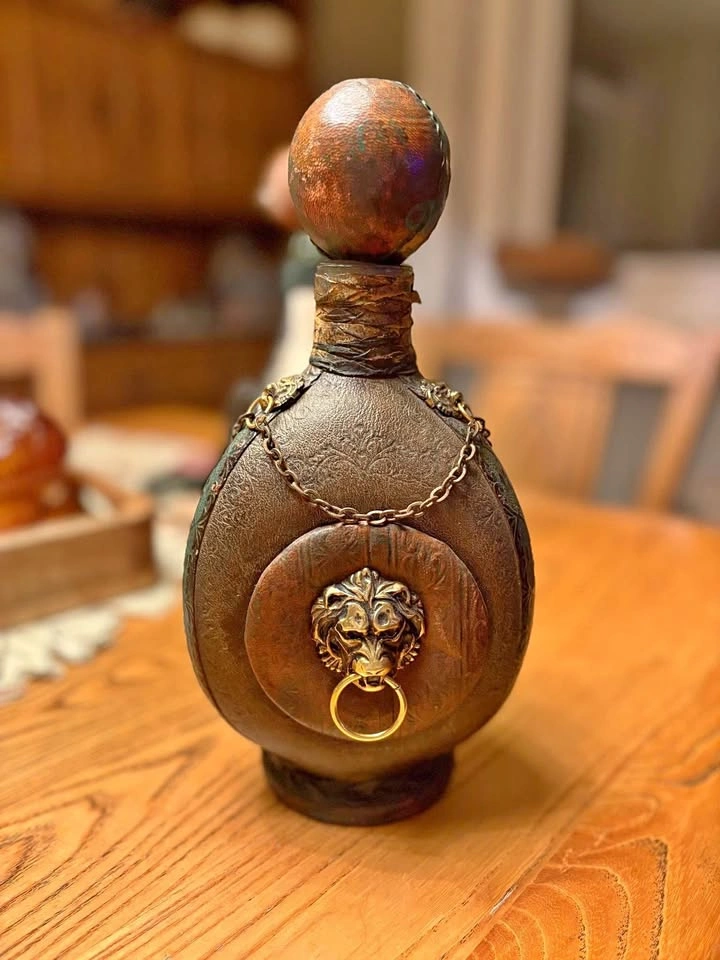 Vintage Italian Leather covered Wine flask. If ad is up it’s ava