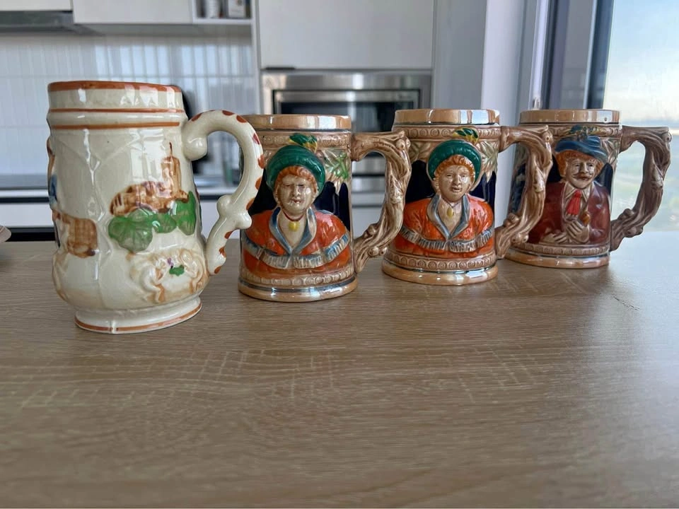 Set of 4 Vintage German-Style Beer Steins