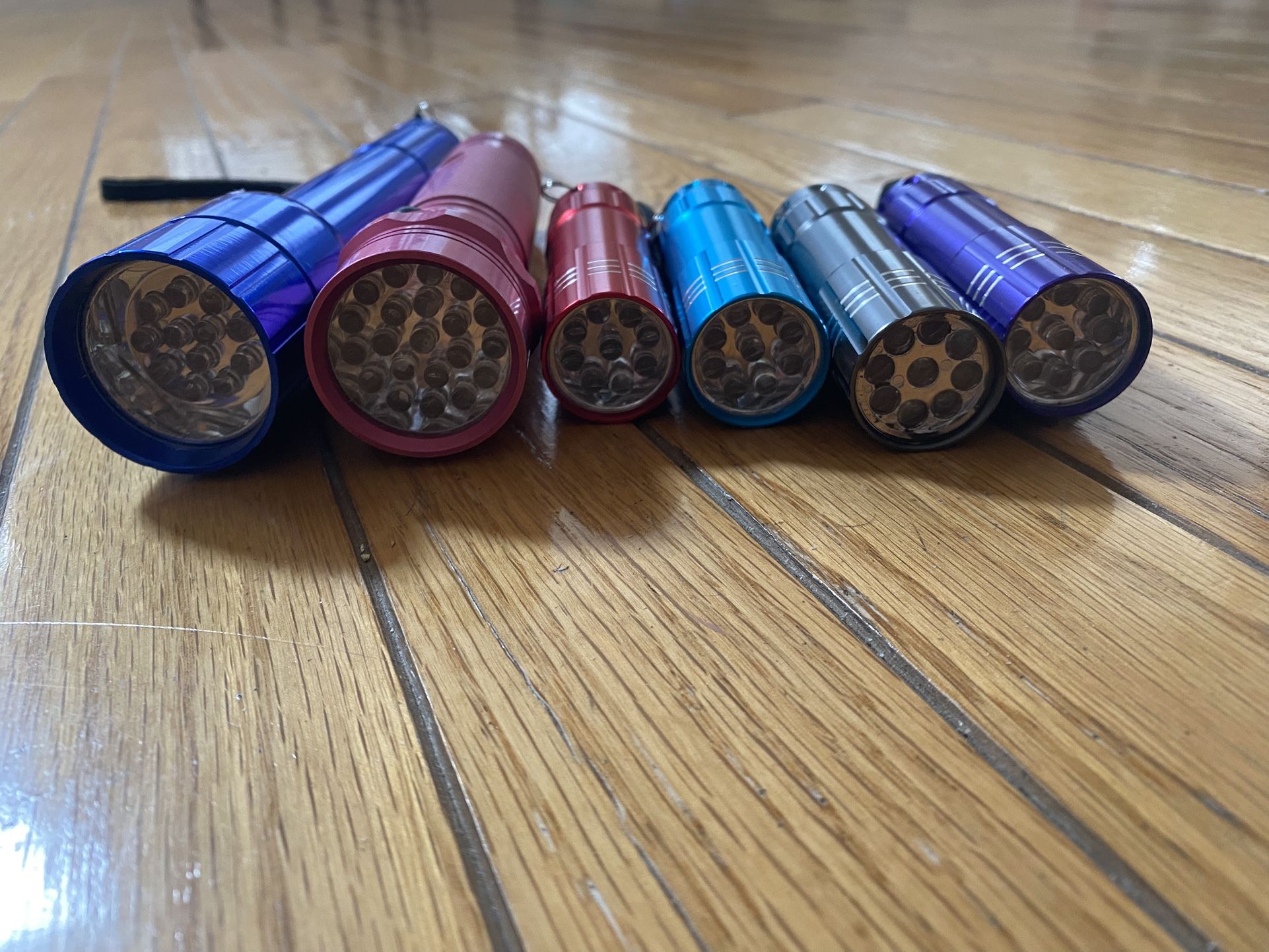 Set of 6 LED Flashlights – Mixed Colors & Sizes