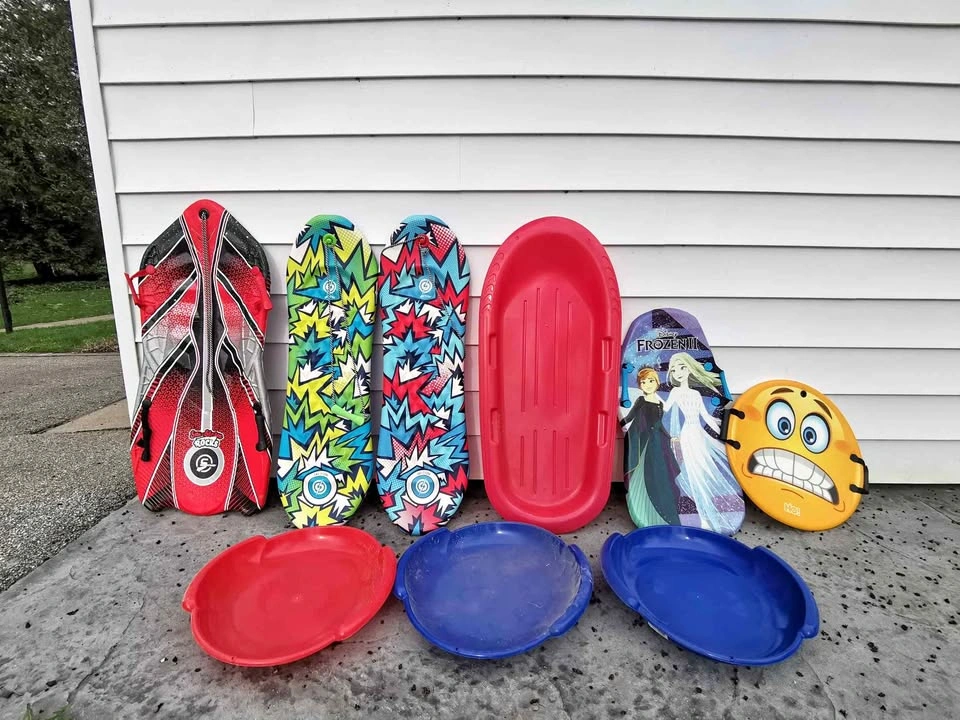Bunch of Snow Sliding Boards