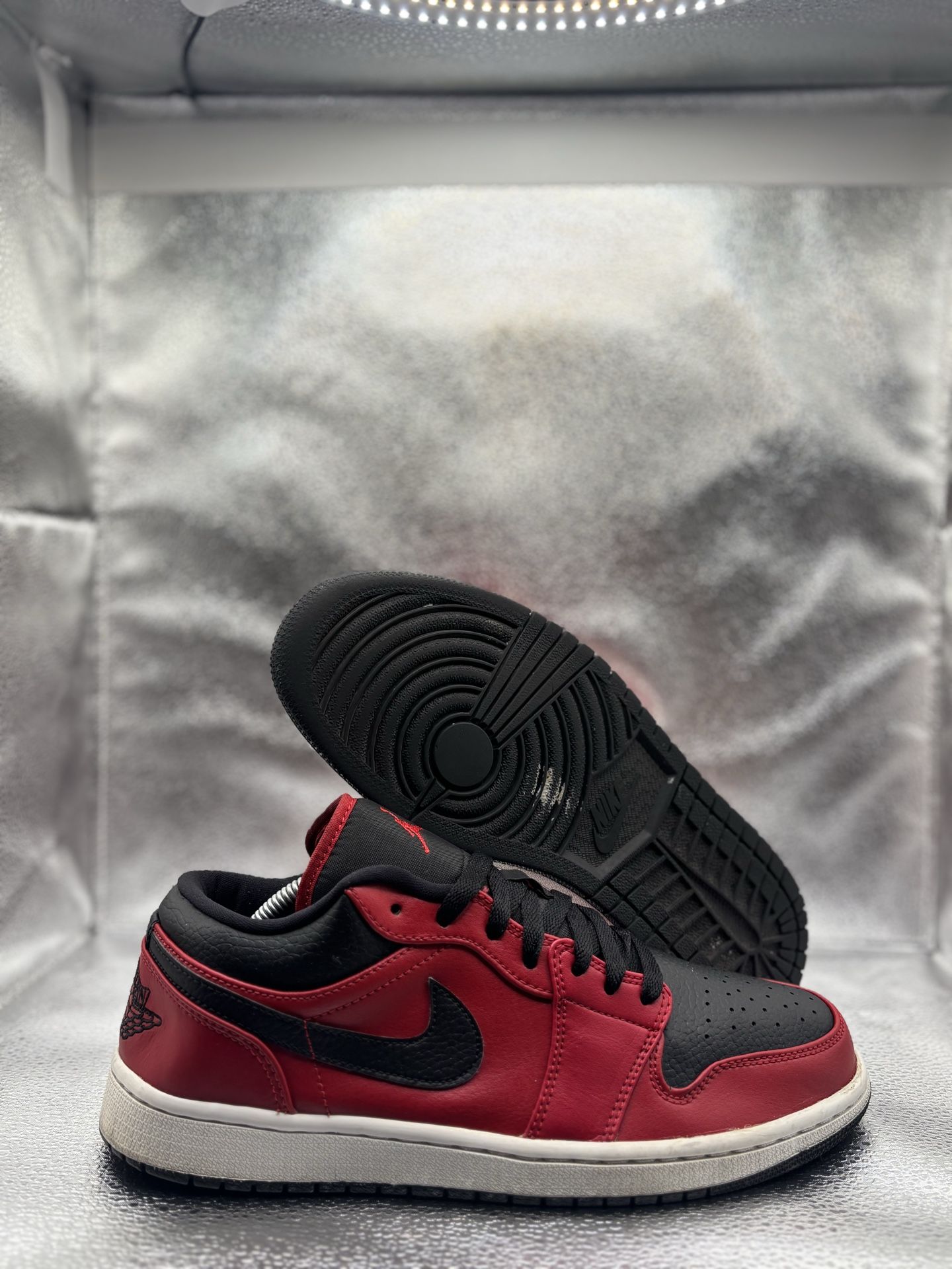 Air Jordan 1 low reverse red pebbled swoosh