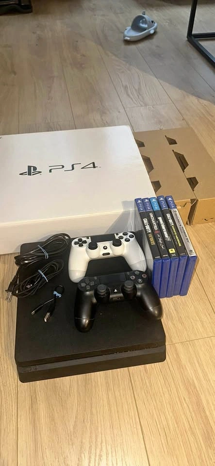 PS4 Slim 500GB Console with 2 Controllers and Games