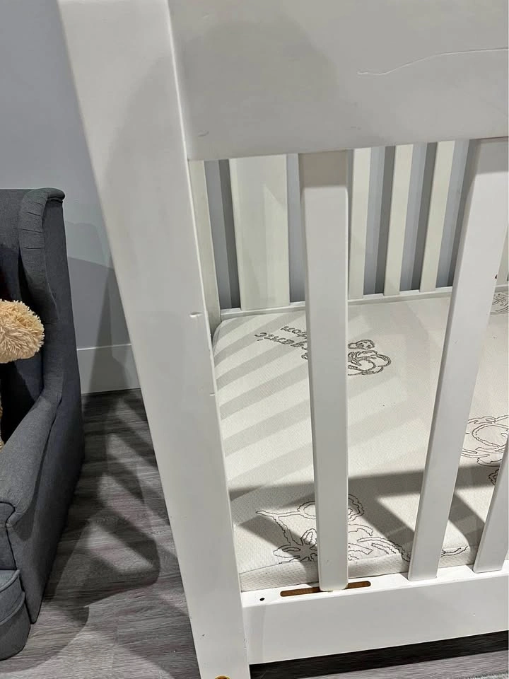 White crib with mattress, IKEA gray kids sofa, 12" bicycle