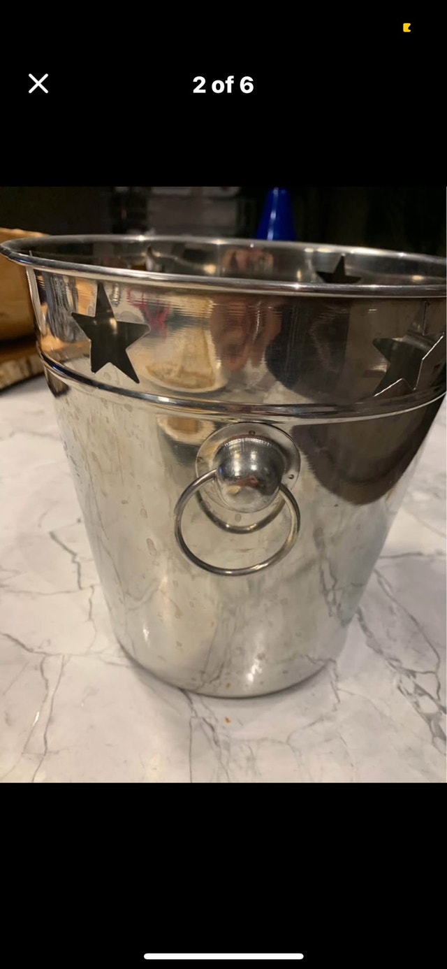 Ice bucket, chrome stars New Year’s Eve party champagne